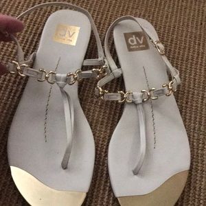Cream sandals with bridle detail